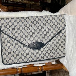 ESTATE SALE GUCCI PORTFOLIO